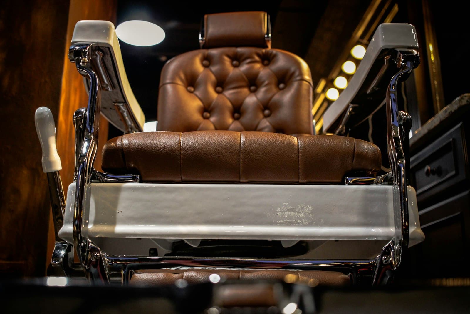Barber chairs and tools inside Straight & Sharp
